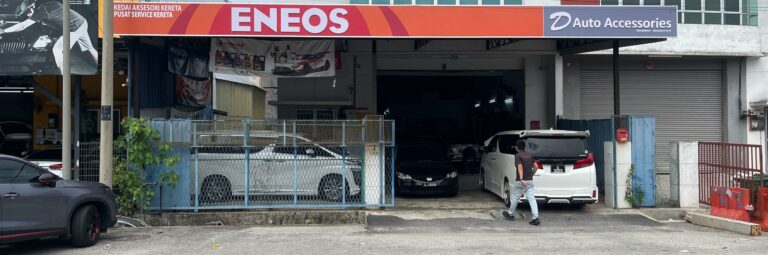 ENEOS signage installation on automotive accessories shop front