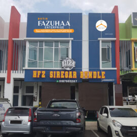 Butik Fazuhaa shop sign with embossed lettering and clean layout