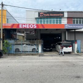 ENEOS signage installation on automotive accessories shop front